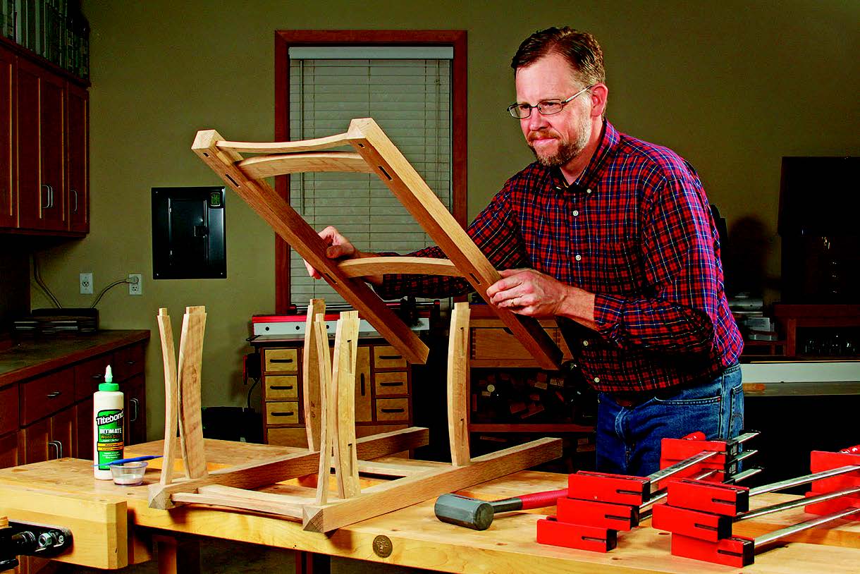 Glue up two side assemblies for the plant stand framework first. When their joints dry, join them to the remaining top rails and aprons to complete the frame. Remember that top rail and apron curves face one another.