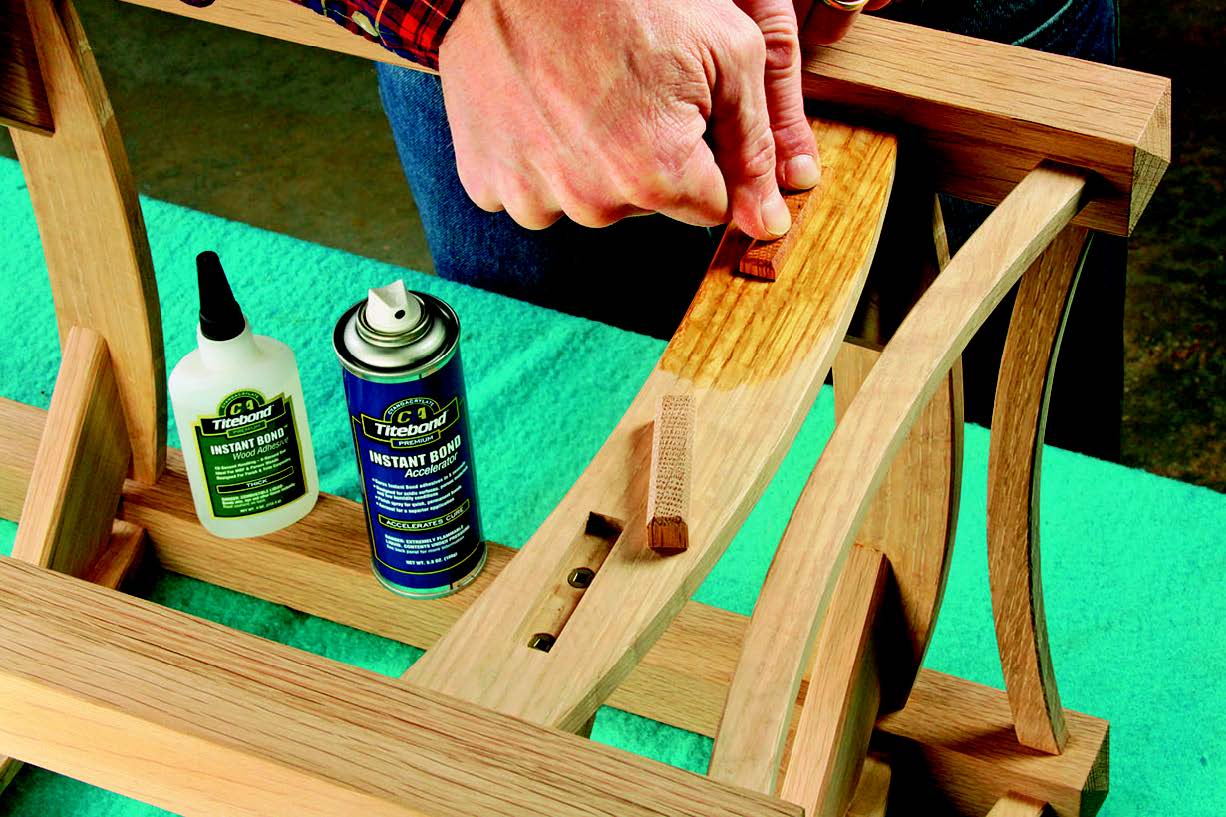 Chamfered faux tenons hide the screw heads and lend a classic Arts & Crafts detail here. CA glue is more than strong enough to secure these parts in their mortises. A spritz of accelerator speeds the glue’s cure time.