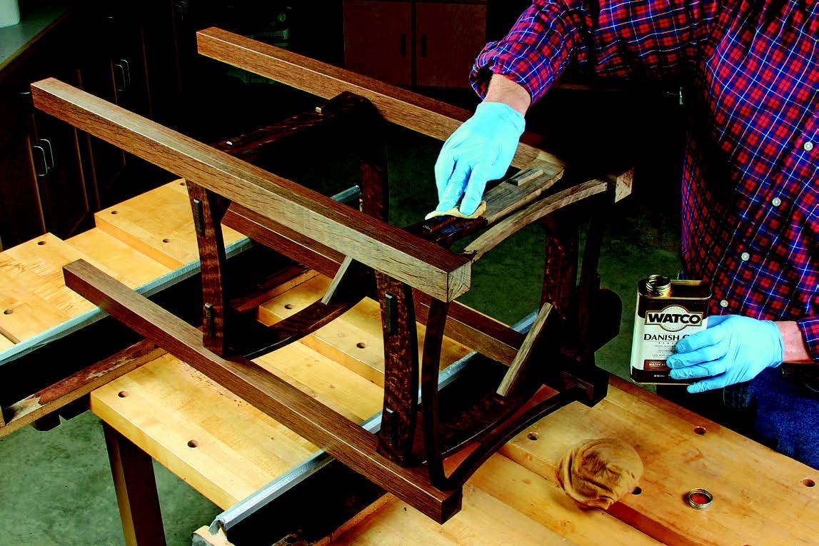 Once fumed, an oil/varnish blend reveals the oak’s new deep-brown color.