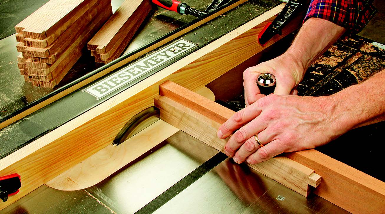 Cut the end shoulders of the rail and apron tenons first. That way, any splintering on the face grain will be removed when you cut the side shoulders next. Here, a top rail blank receives a deep shoulder cut.